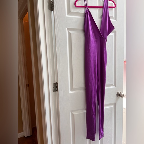 Purple jumpsuit with cleavage - Picture 2 of 3